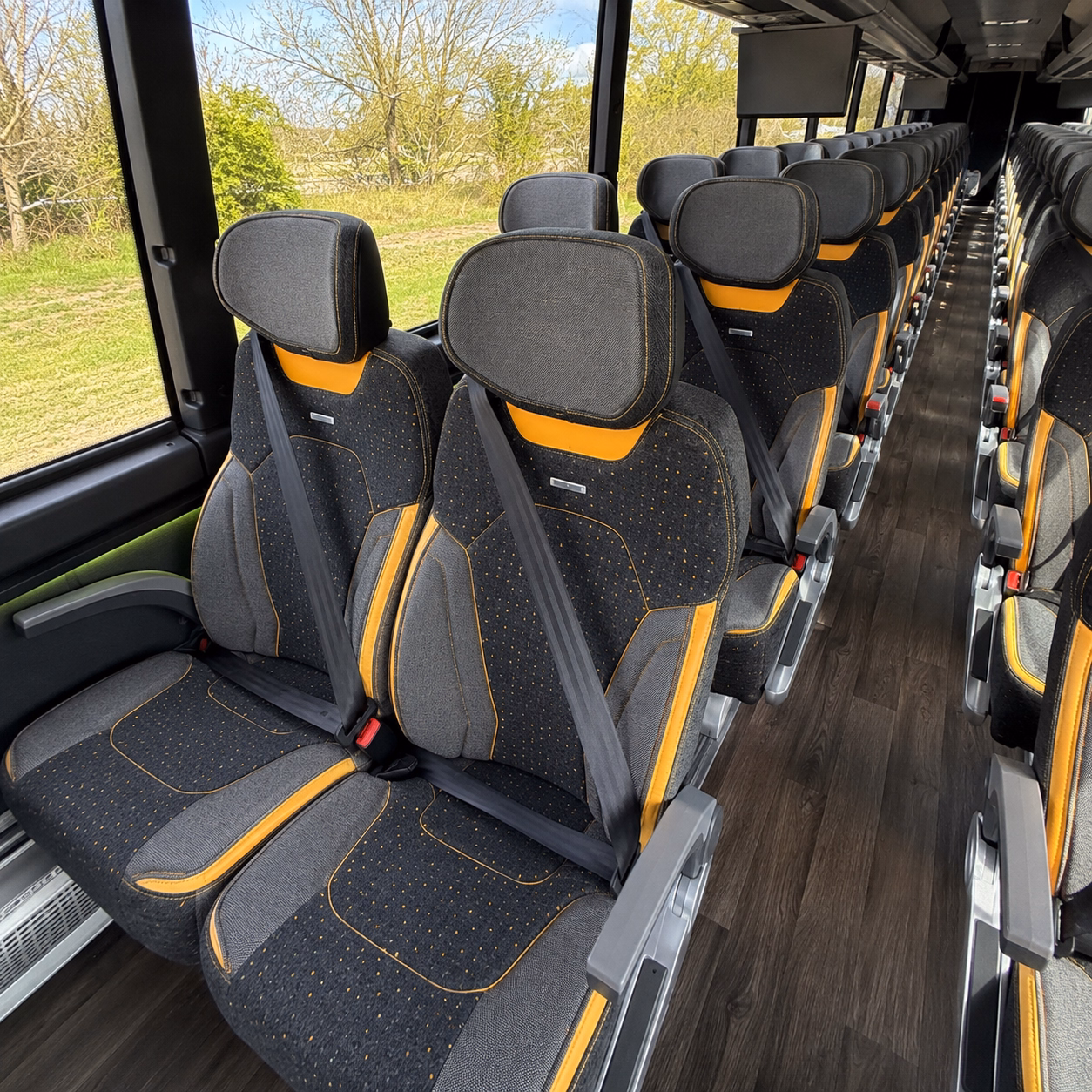 how seasonality and peak times affect charter bus rates in clinton township michigan